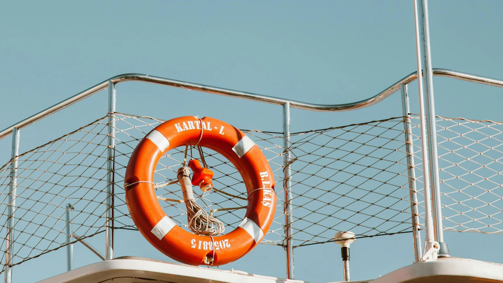 The lifebuoy as a symbol of the physical and medical fitness of seafarers, which is an essential prerequisite for working at sea.