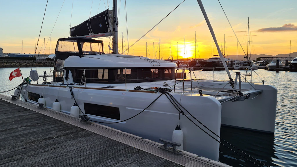 A catamaran under the Swiss flag.